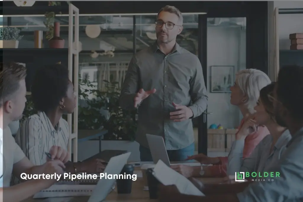 Fractional CMO Reviewing Quarterly Pipeline Planning with Team